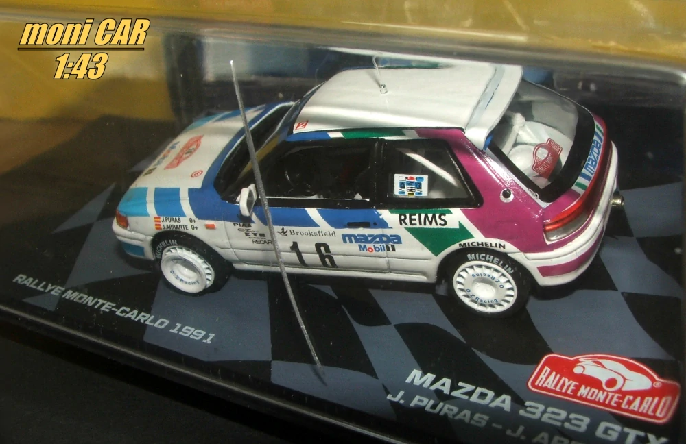 MAZDA 323 GTX 1989 No.16 - J. Puras - J. Arrarte - Rallye Monte Carlo 1991(1:43) Altaya/IXO