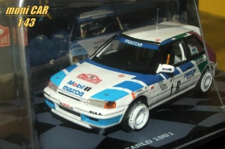MAZDA 323 GTX 1989 No.16 - J. Puras - J. Arrarte - Rallye Monte Carlo 1991(1:43) Altaya/IXO